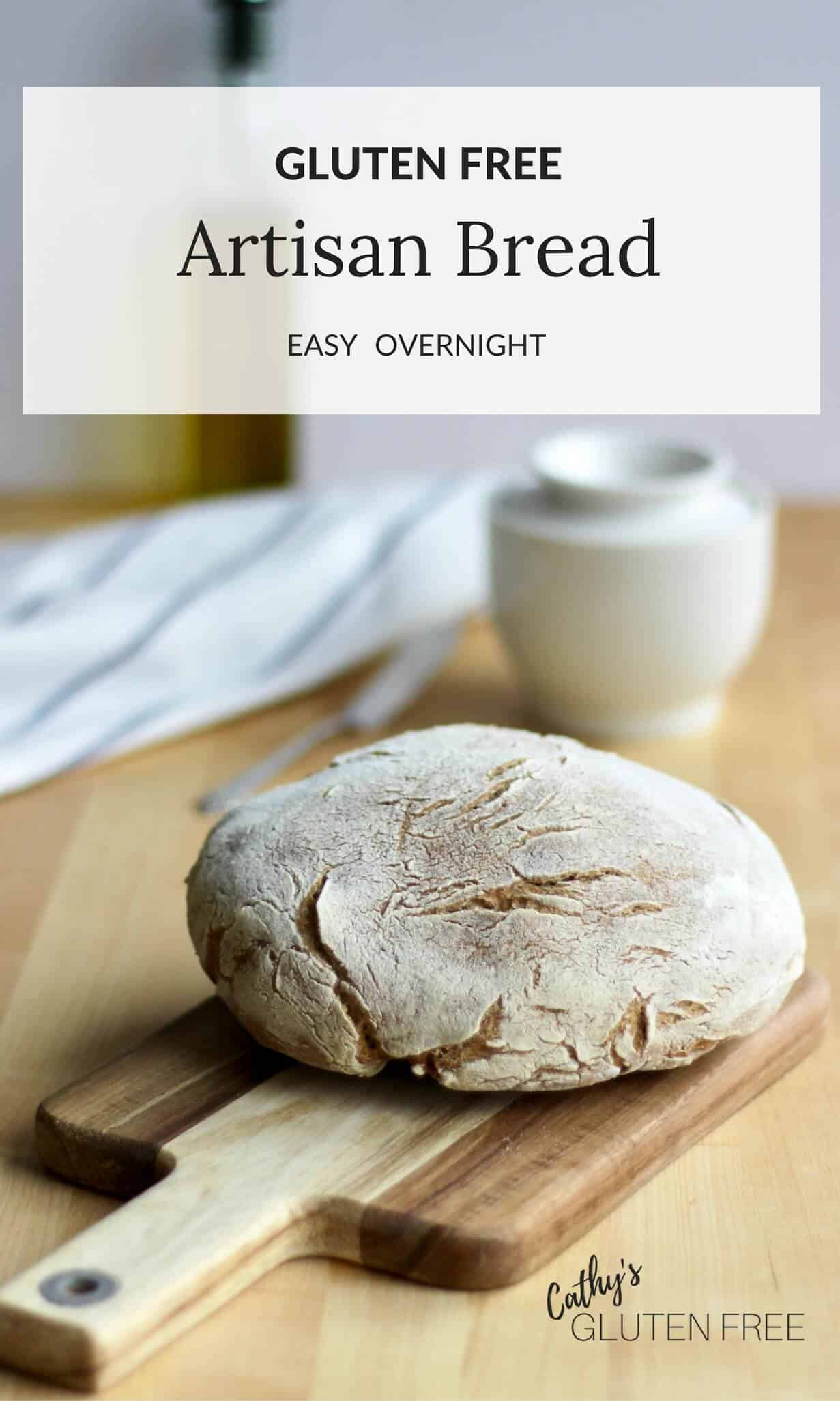 round loaf of artisan bread on wooden board