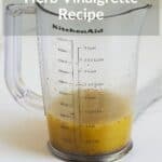 emulsified herb vinaigrette in KitchenAid blender jar.