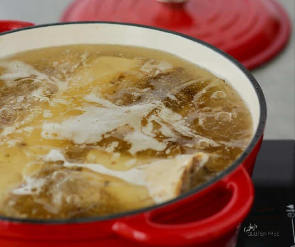 closeup of bone broth in pot