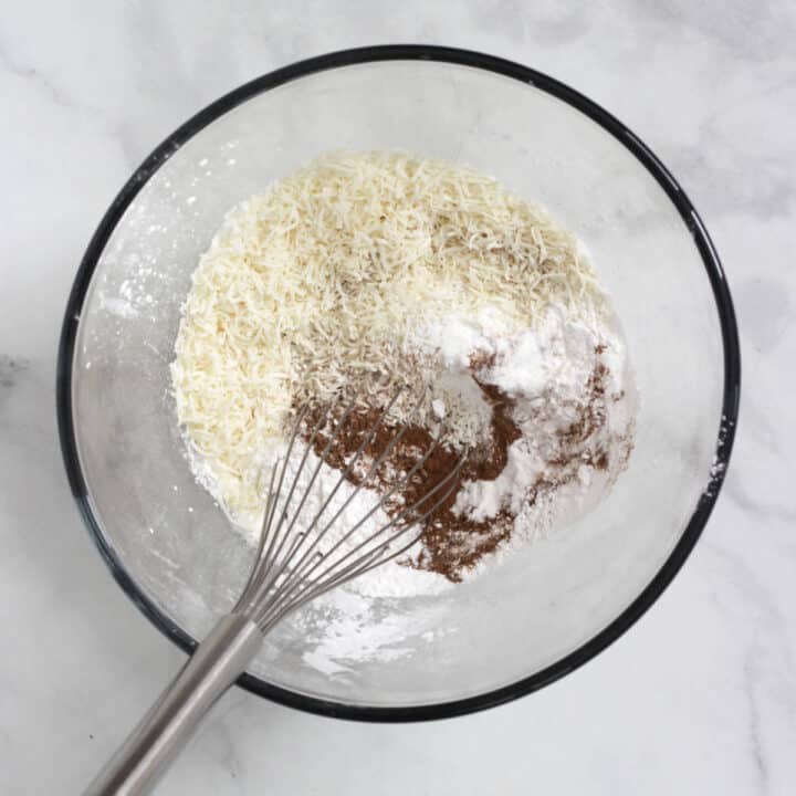 whisk in mixture of flours in glass bowl