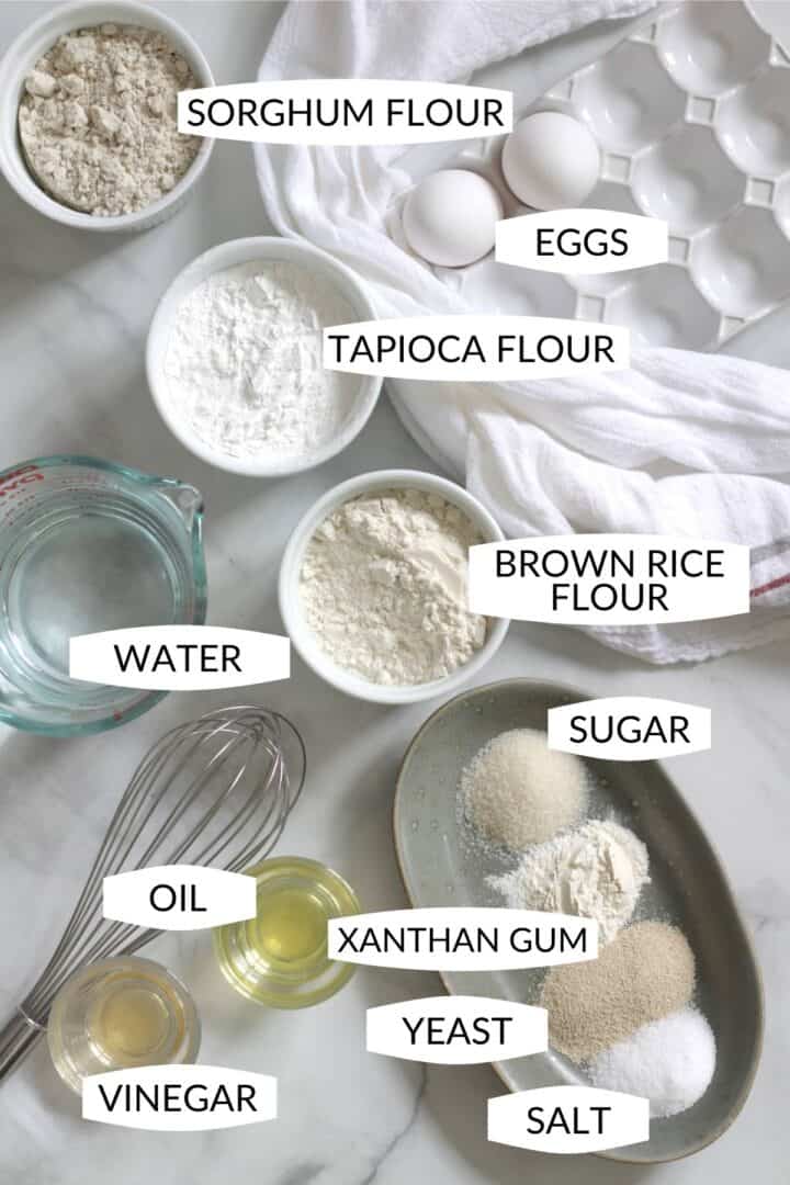 ingredients for making gluten free sorghum bread in small bowls with labels