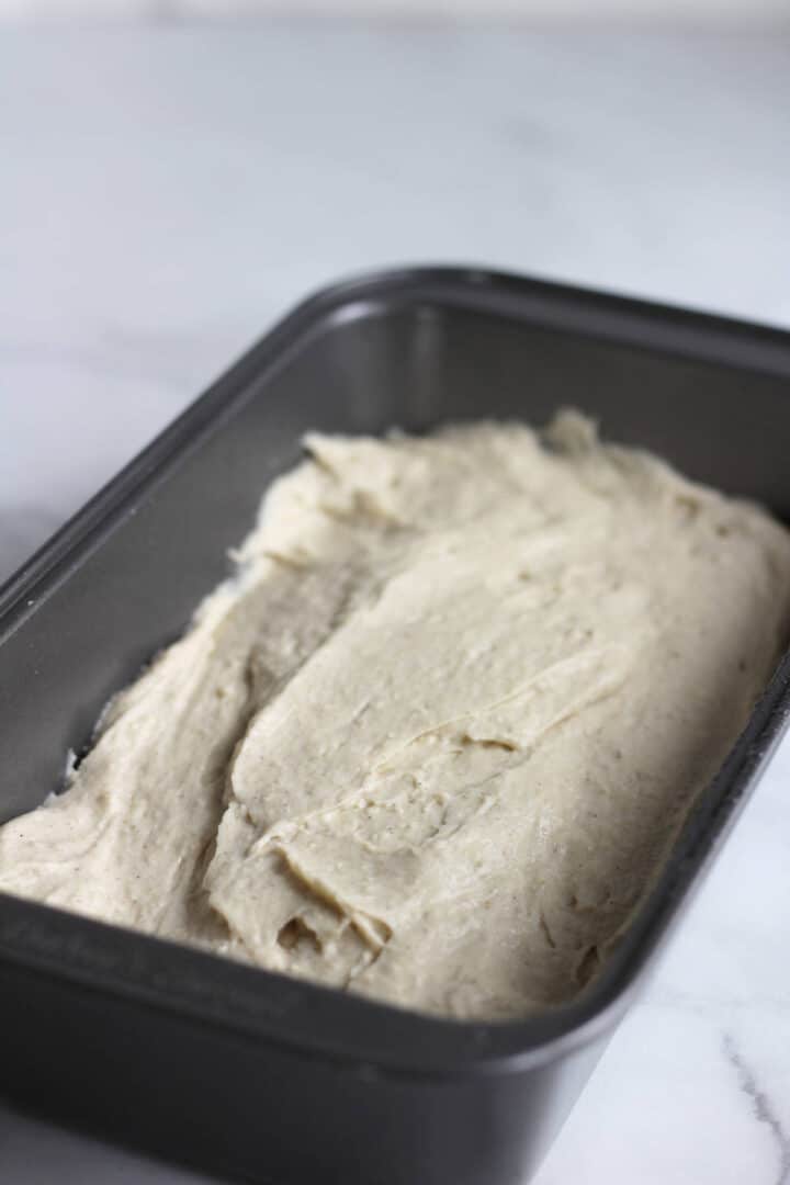 moist pale dough spread into a nonstick metal loaf pan.