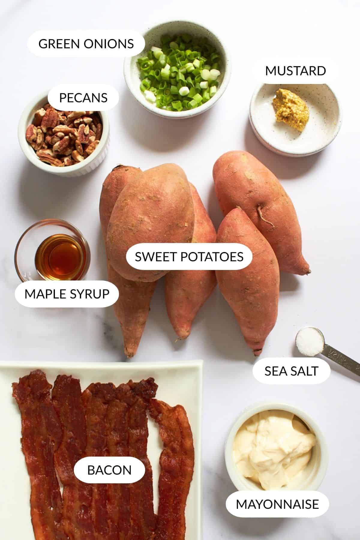 sweet potatoes, bacon, pecans, mayonnaise, mustard, salt, maple syrup, and green onions.