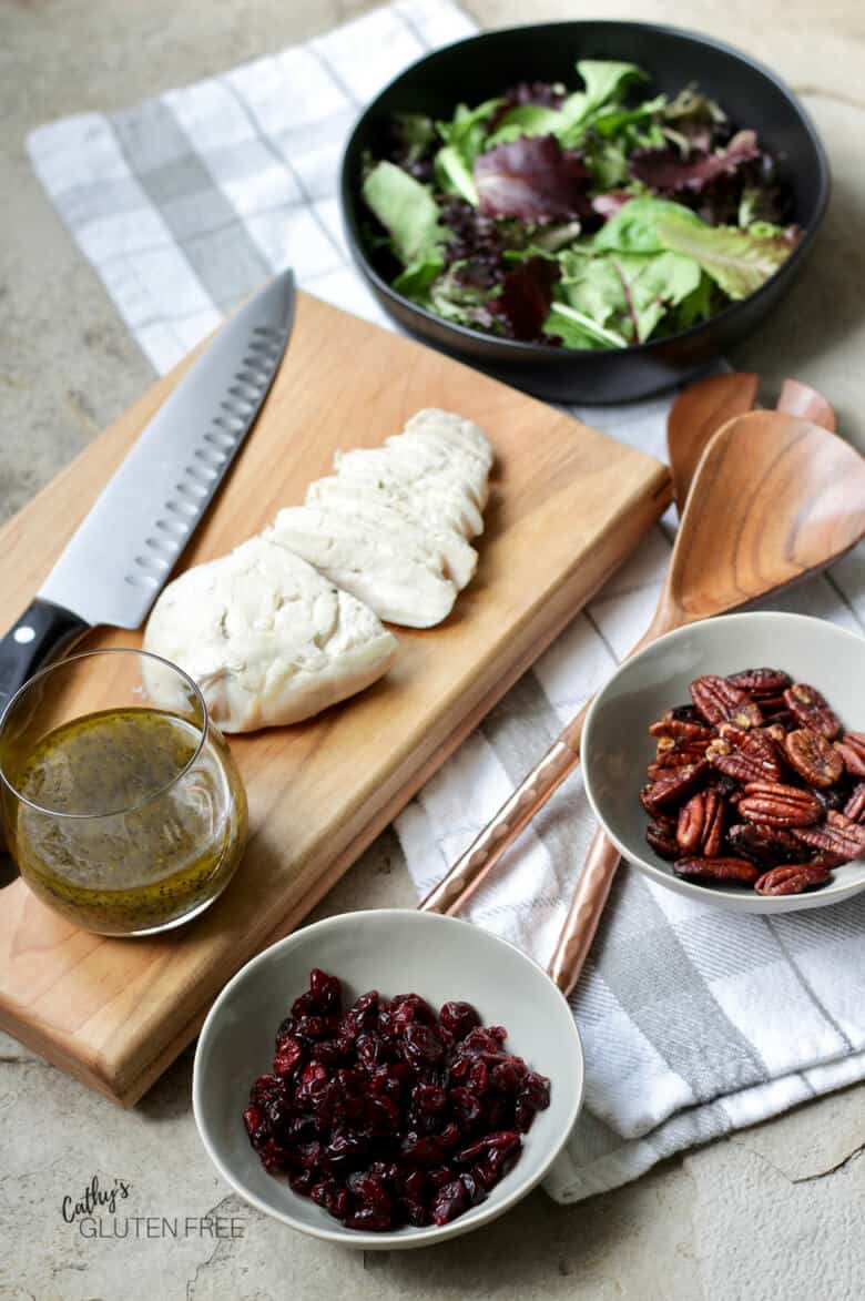 Cooked chicken, dried cranberries, lettuce, candied pecans, and poppyseed dressing.