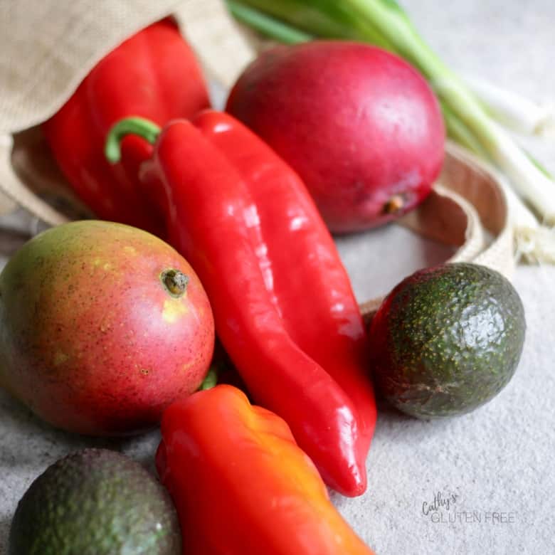 Red pepper, mangos, green onions, and avocado