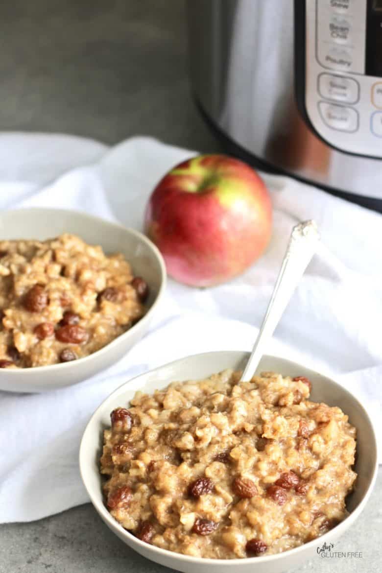 two bowls of oatmeal porridge with apple and Instant Pot in background