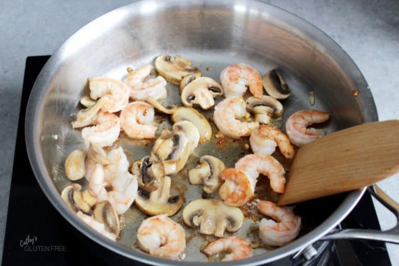 shrimp and mushrooms in pan