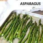 Asparagus spread out on a pan