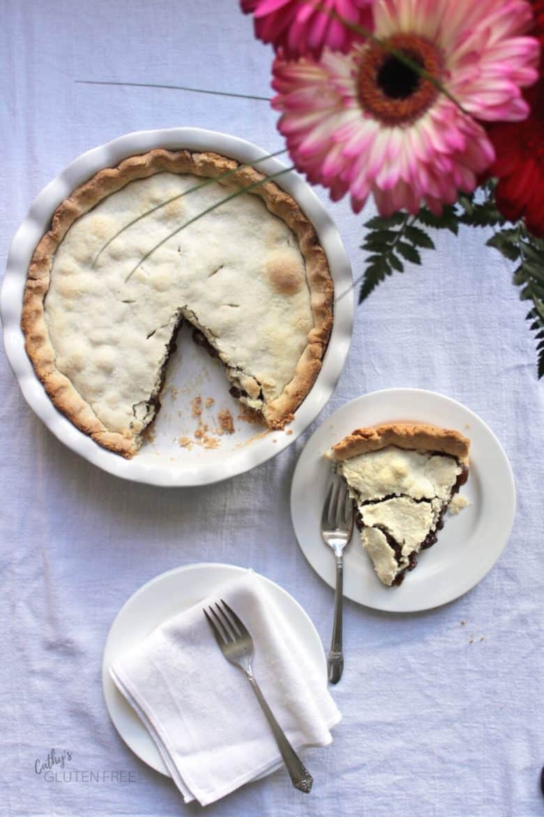 top down view of raisin pie with one slice plated