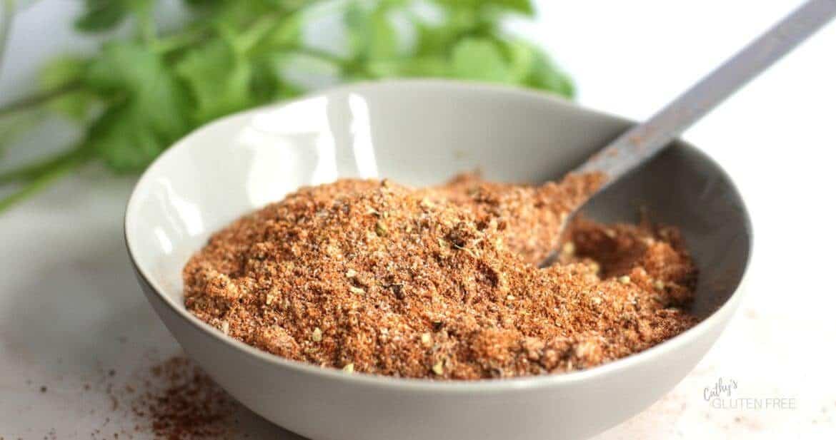 taco seasoning mix and spoon in grey bowl