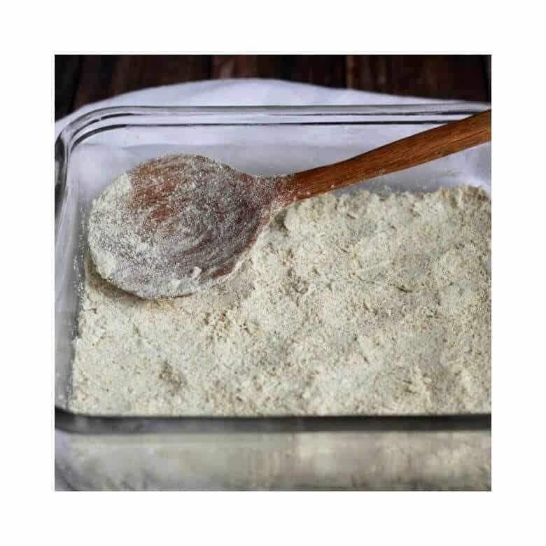 flour mixture pressed into bottom of square glass pan