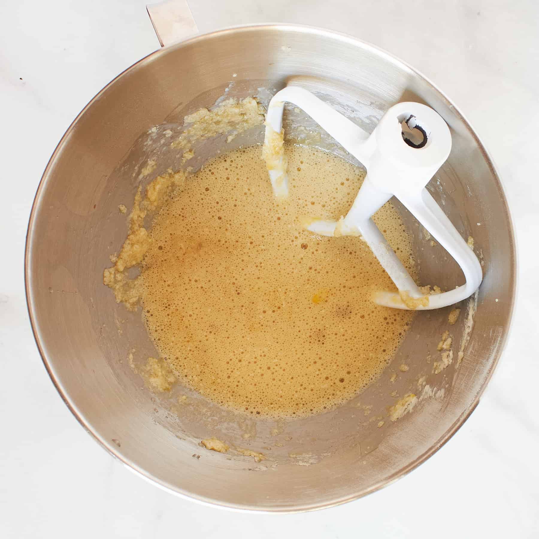 beater in wet, egg mixture in mixing bowl.