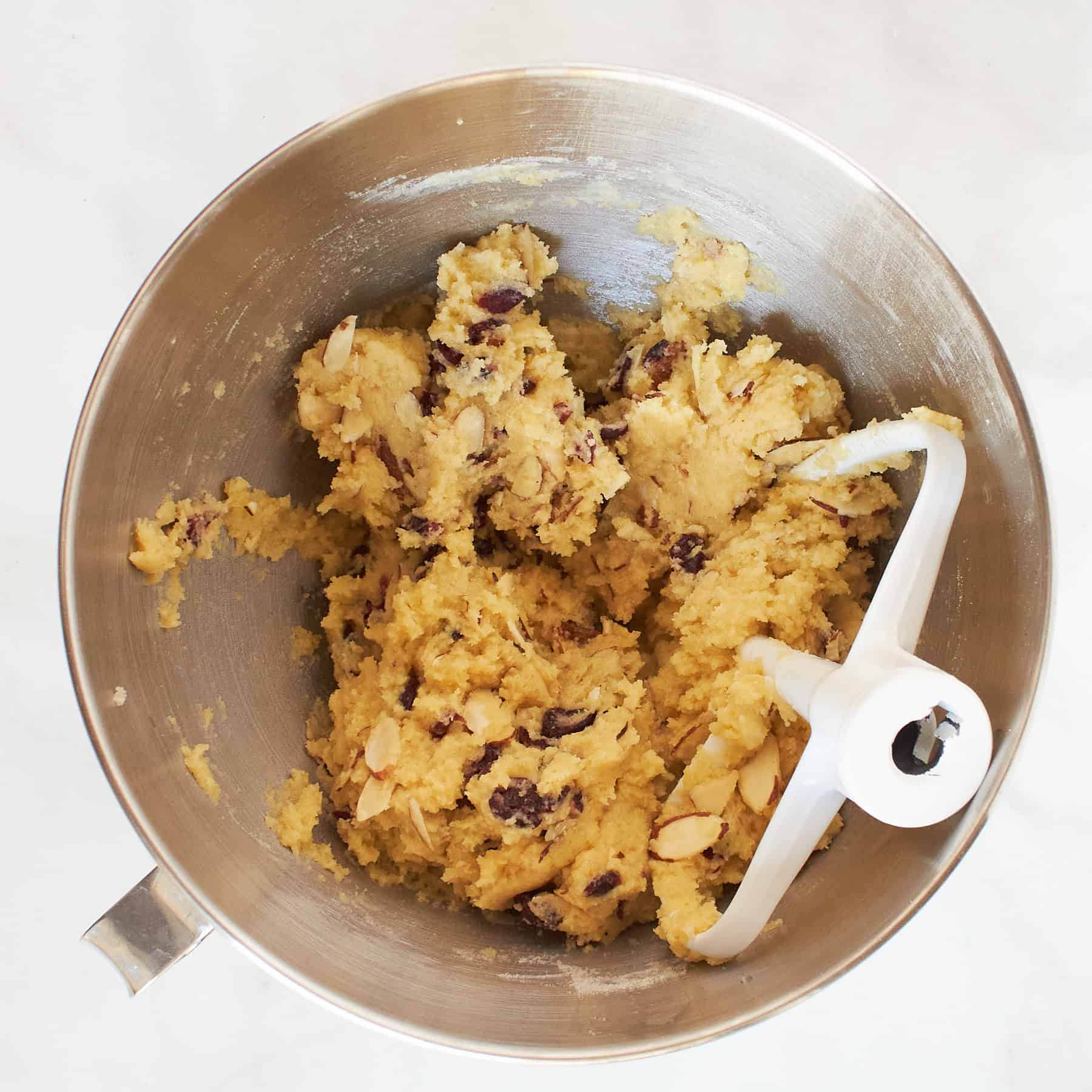 cranberry-studded batter in mixing bowl.