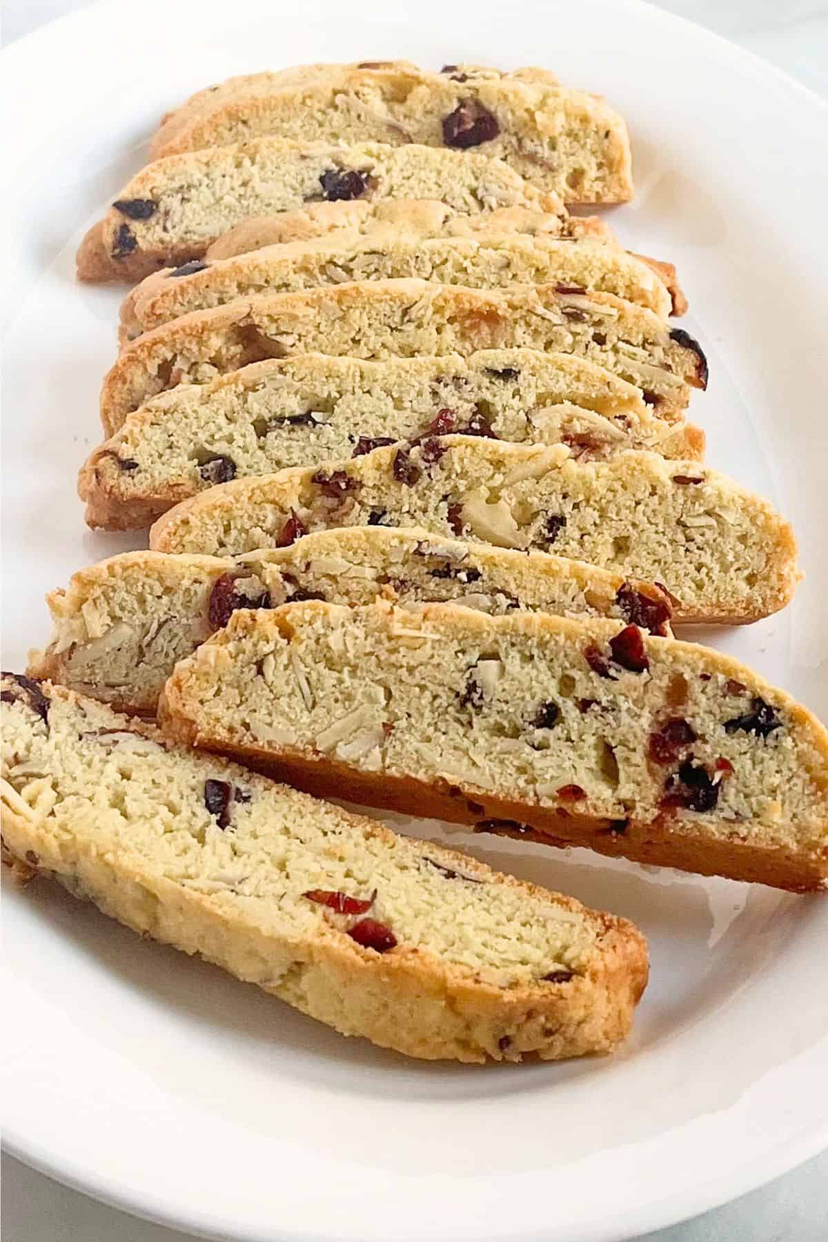 gluten-free cranberry biscotti arranged on a white platter.
