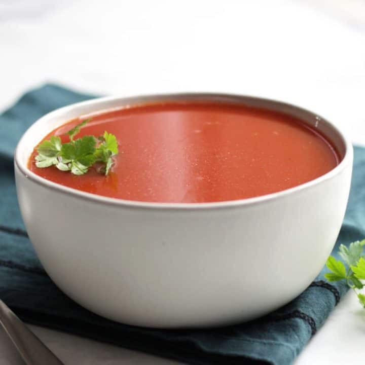 tomato soup in white bowl