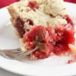 bite of gluten free strawberry rhubarb pie on fork