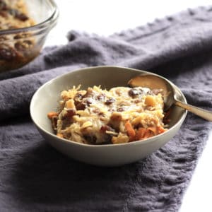 carrot cake baked overnight oats served in bowl on violet napkin