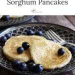 sorghum pancakes on black plate