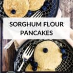overhead view of pancakes on black plates, sprinkled with blueberries.