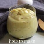 mayonnaise in glass bowl with egg on lavender napkin behind, and text for Pinterest