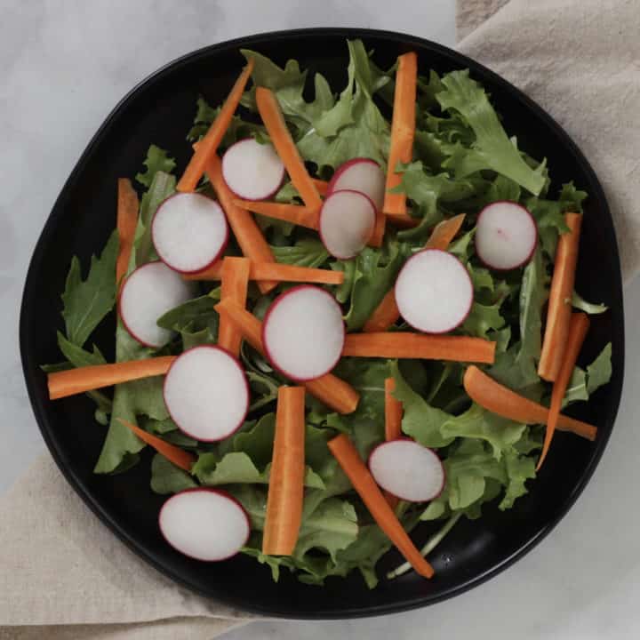 slices of radish added to the salad