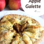 whole apple galette with title text, apples in background