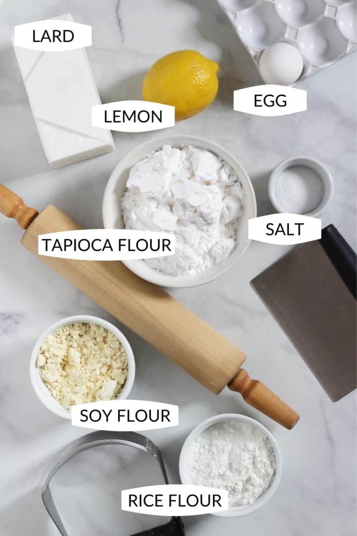 ingredients for gluten free pie crust in individual bowls with labels