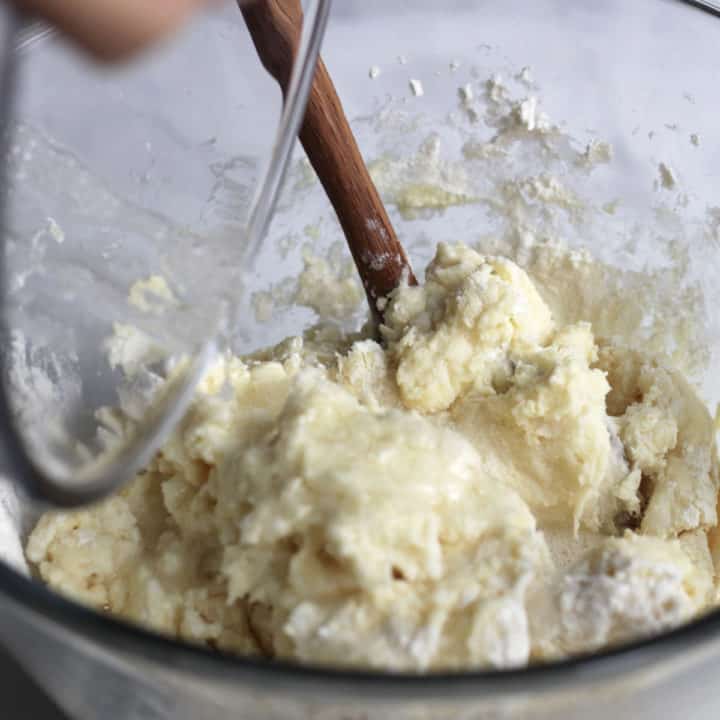 beaten egg white is poured over the dough