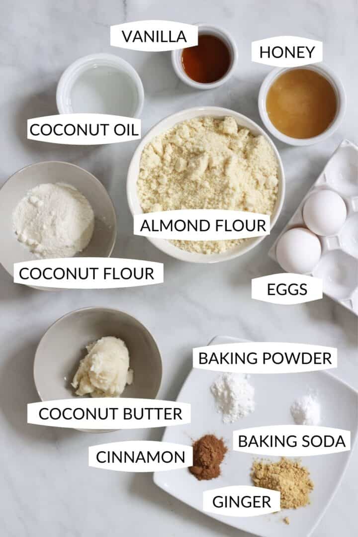 ingredients for soft gingerbread cookies in individual bowls with labels