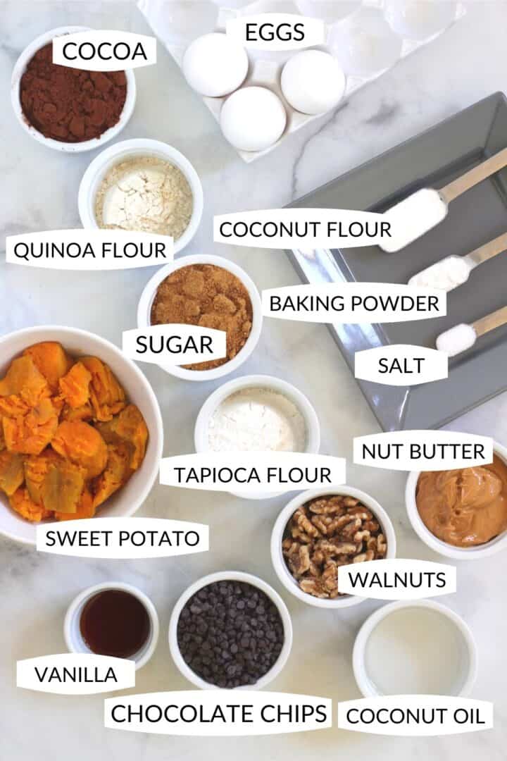 ingredients for sweet potato brownies in individual bowls with labels