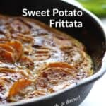 closeup of golden browned sweet potato frittata in cast iron skillet.