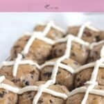 rows of gluten free hot cross buns with title on pink banner