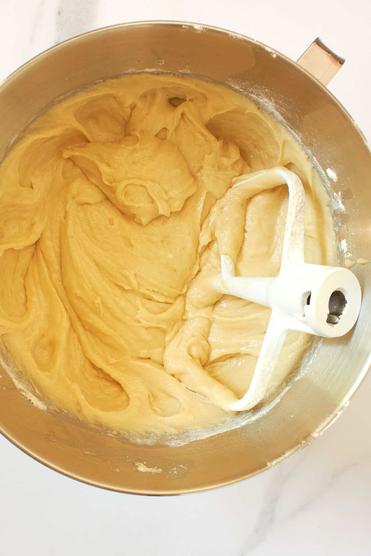 creamy, moist, beaten batter in mixing bowl.