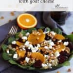 green salad topped with sliced beets, orange segments, feta cheese, and walnuts with title text