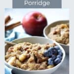 one and one-half bowls of quinoa porridge showing, apple in background, blueberries on top