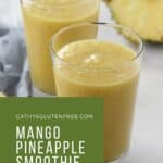 two glasses of thick, yellow smoothie with cut pineapple in background overlaid with text