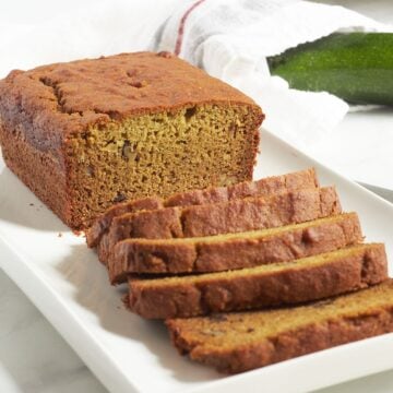partially-sliced loaf of gluten-free zucchini bread