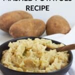 mashed potatoes in black bowl with whole potatoes and text in background.