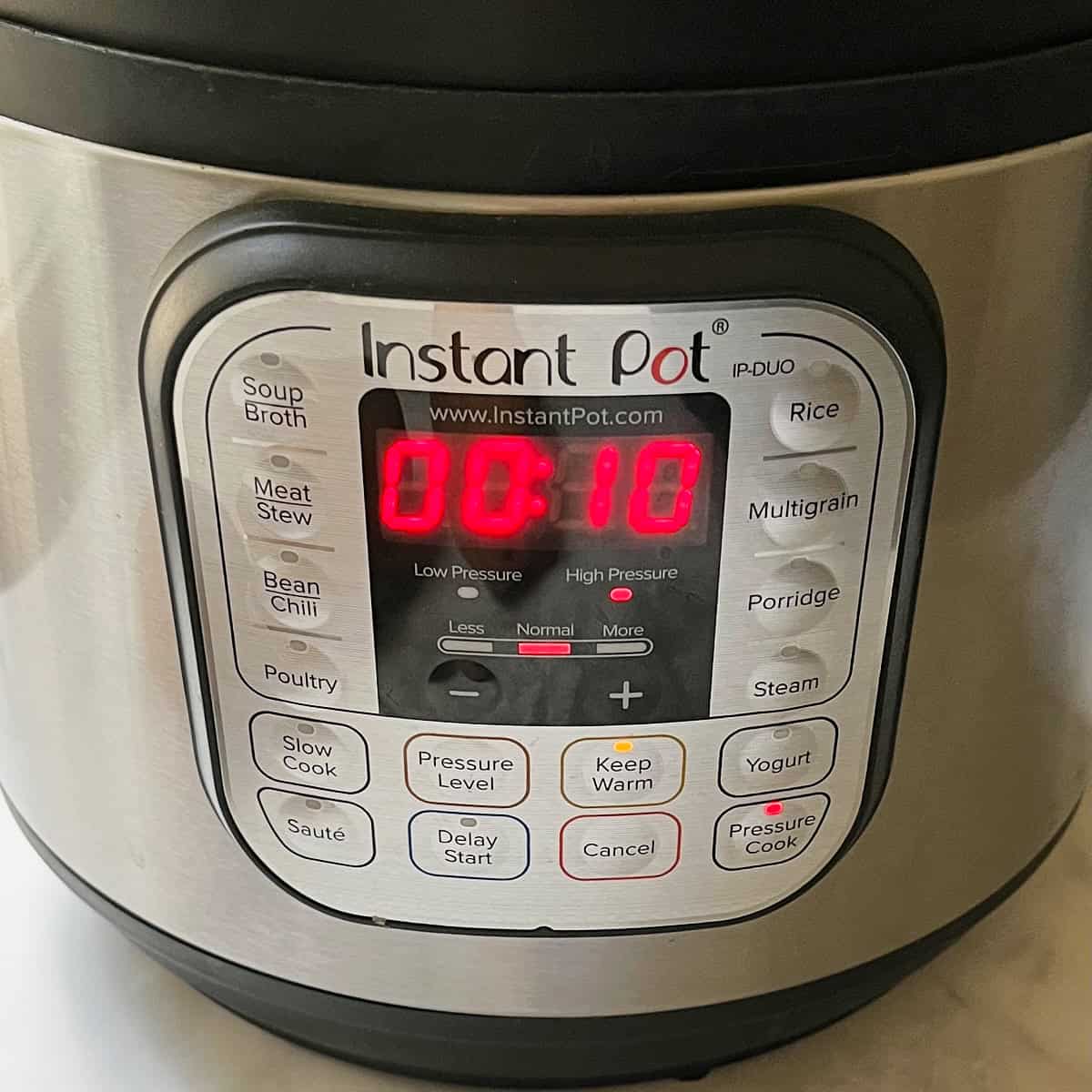 Instant Pot controls set to pressure cook 10 minutes.
