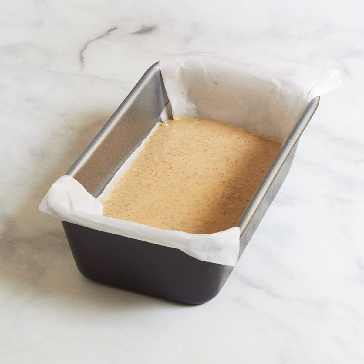 raw batter in loaf pan.