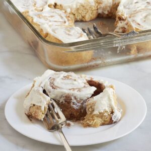 soft, gooey cinnamon roll pulled open with a fork.