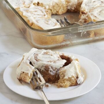 soft, gooey cinnamon roll pulled open with a fork.