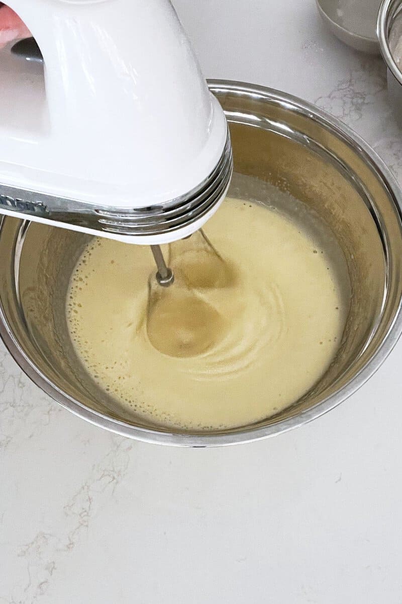 thick, pale yellow batter with tracks left by beaters.