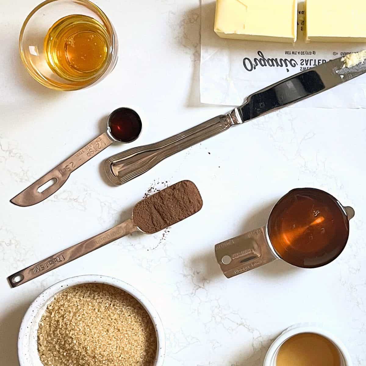 flatlay of measuring cups and spoons filled with gluten-free ingredients.