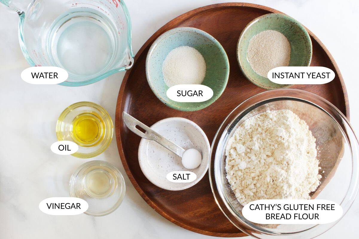 gluten-free pizza dough ingredients in small bowls, labeled.