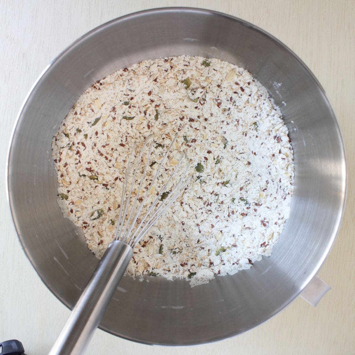 whisk in dry flour and seed mixture in mixing bowl.