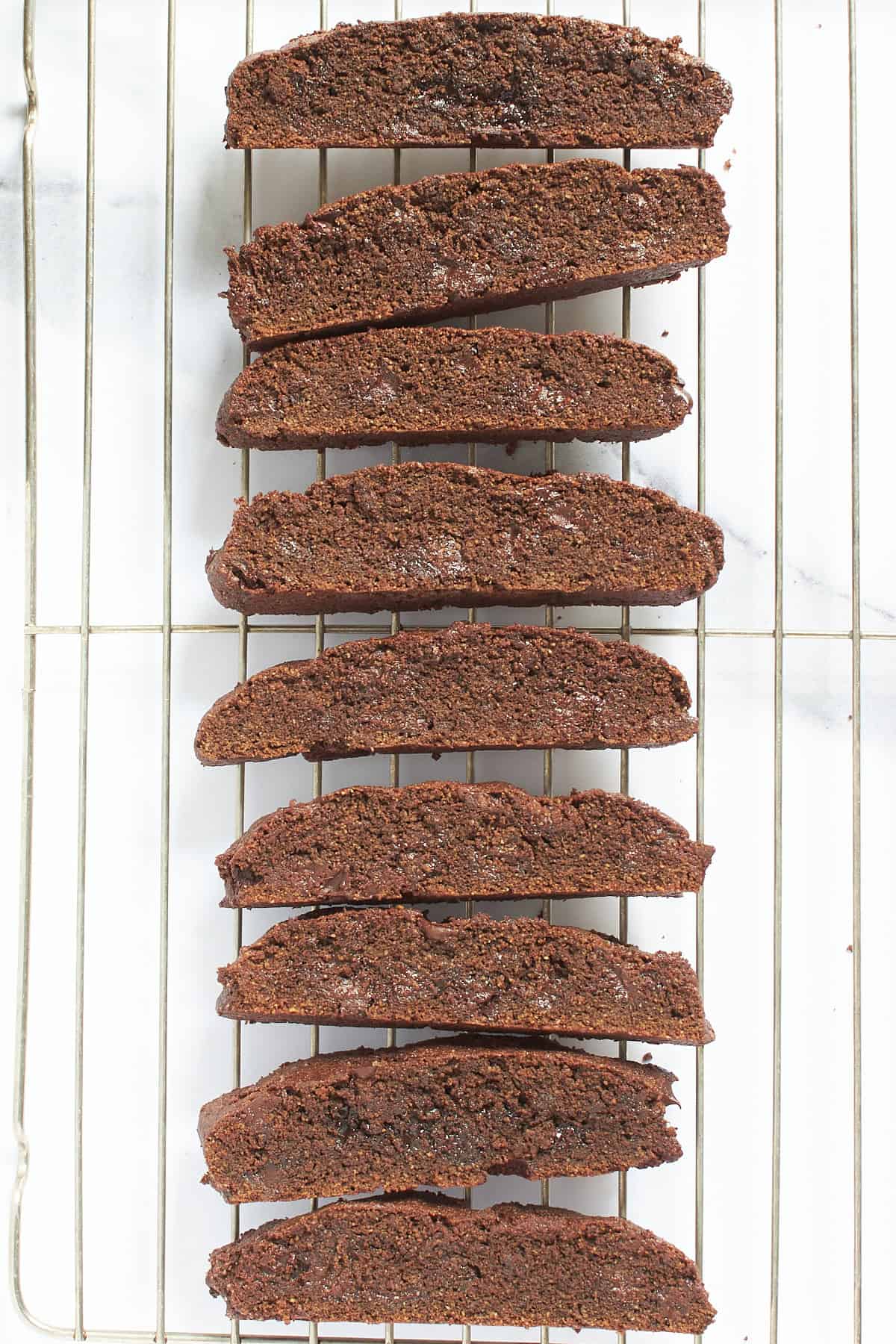gluten-free chocolate biscotti cooling on wire rack.