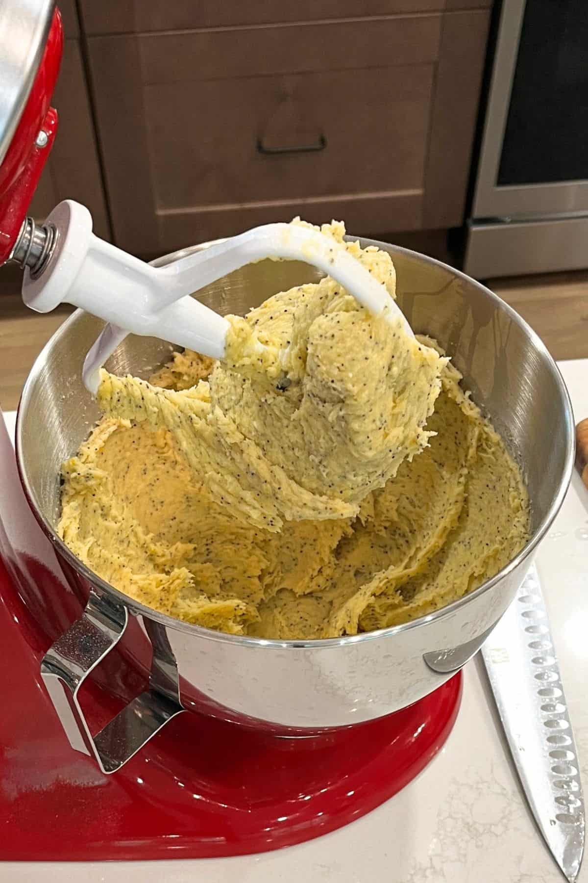 golden batter in bowl of stand mixer.