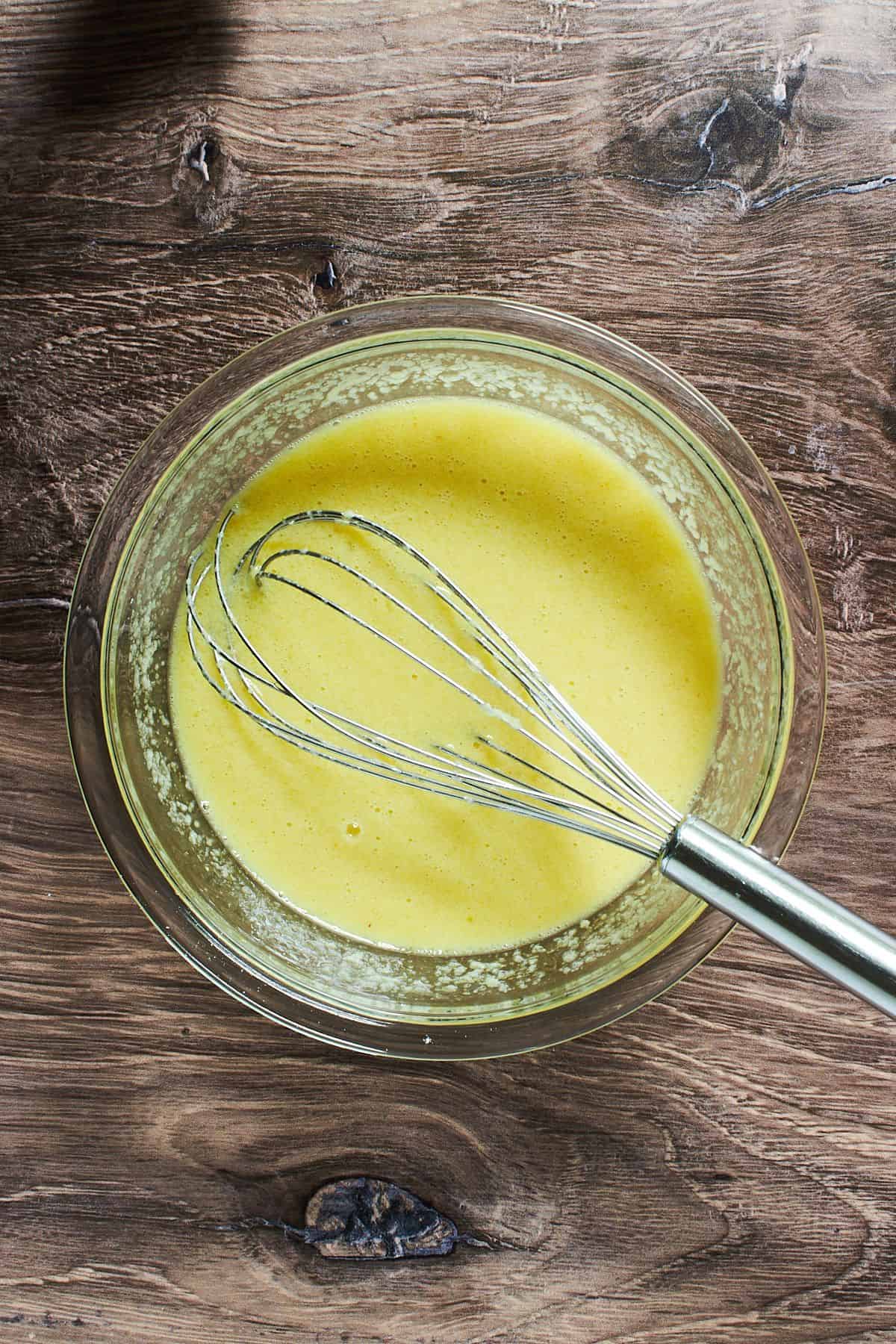 yellow, liquid mixture in a glass bowl.