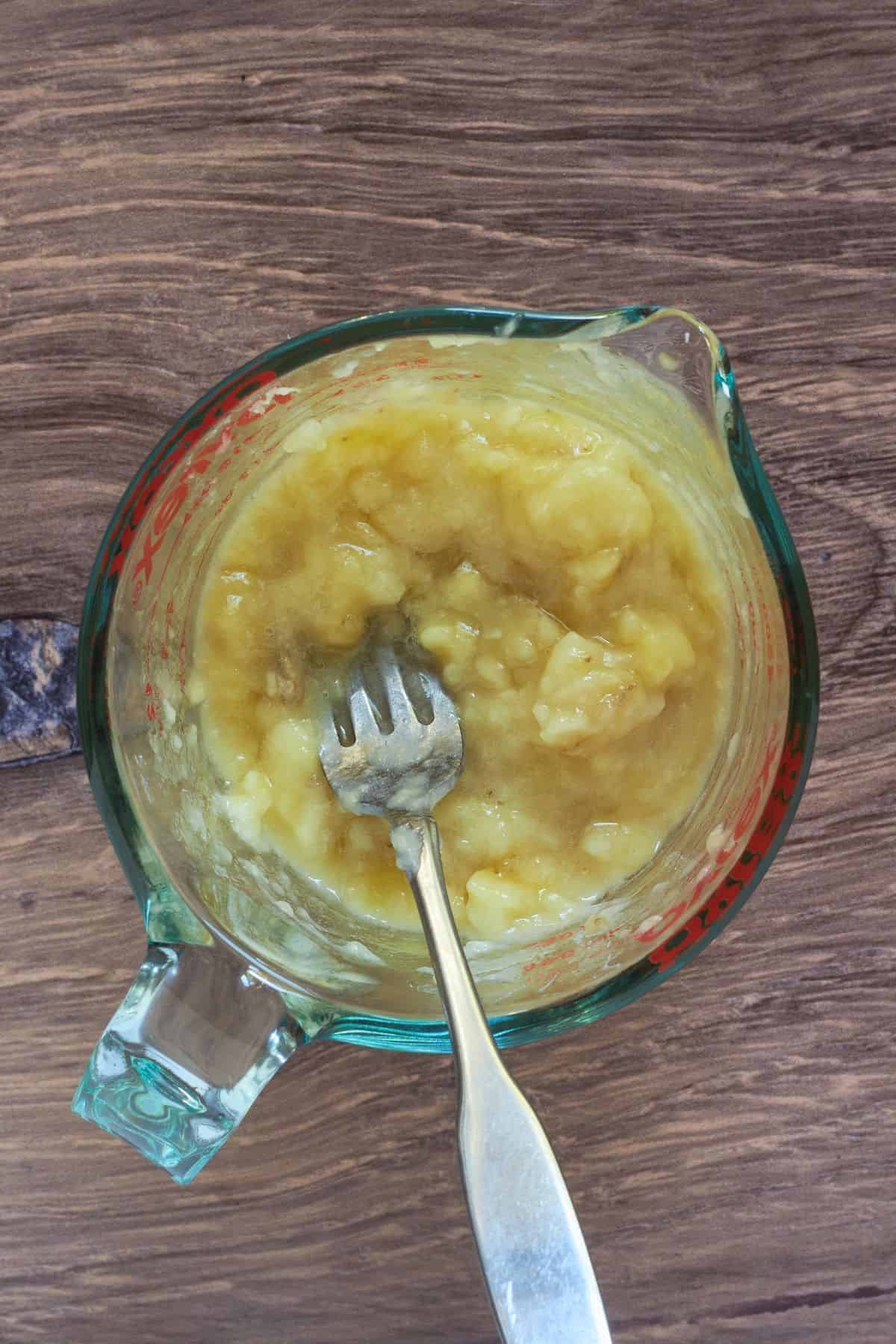 mashed bananas in 2-cup pyrex measure.